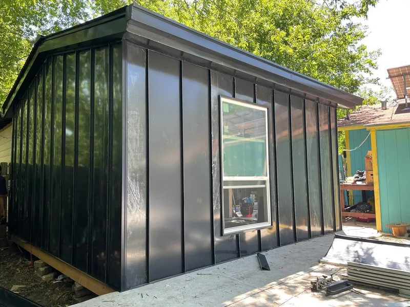 Black standing seam metal wall panels for Roof Inspection in Brook Highland