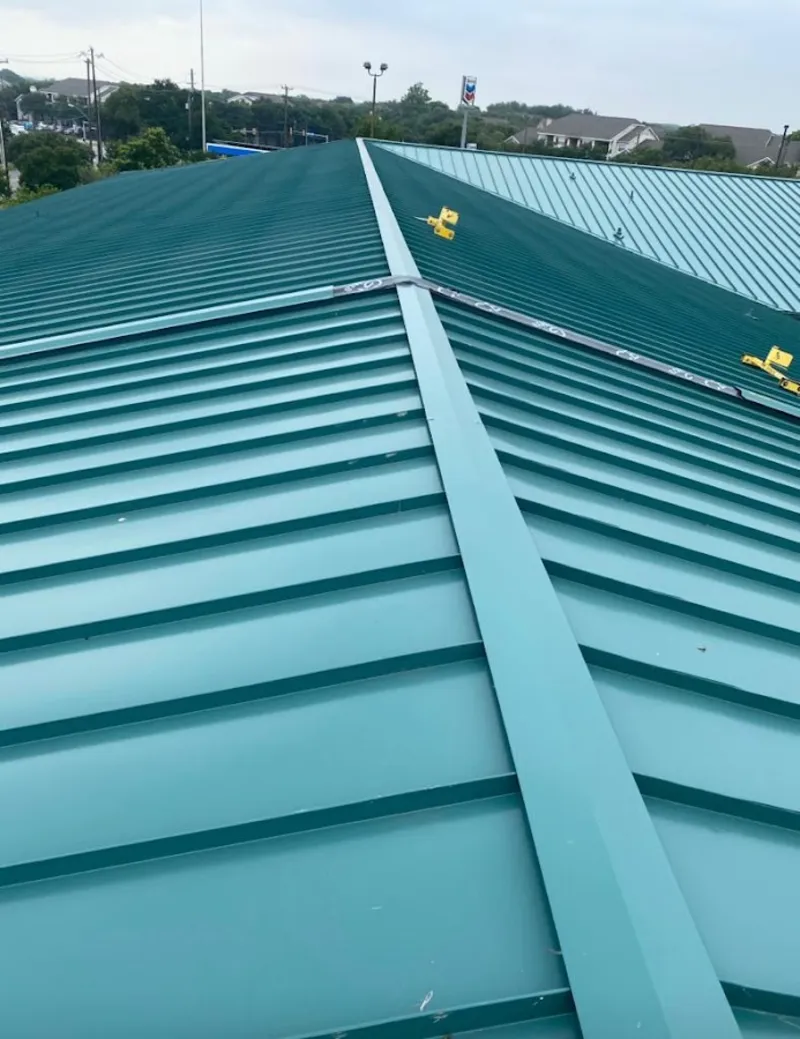 Green commercial metal roof ridge and valley for Metal Roof Repair in Brook Highland