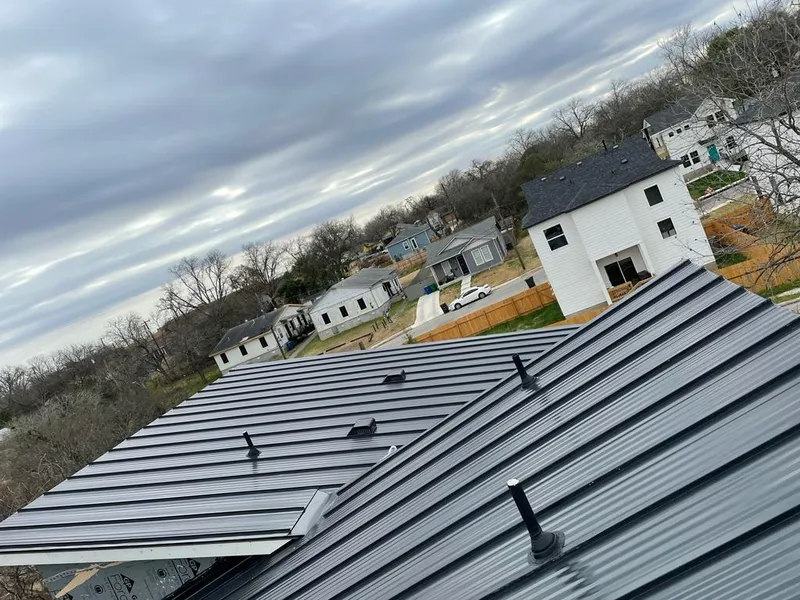 Standing seam metal roof panels with vents for Skylight Repair in Brook Highland